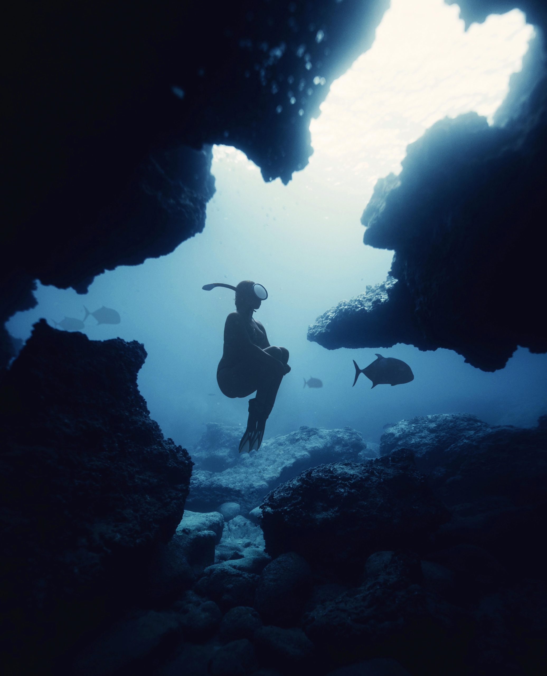 full-shot-swimmer-with-rocks